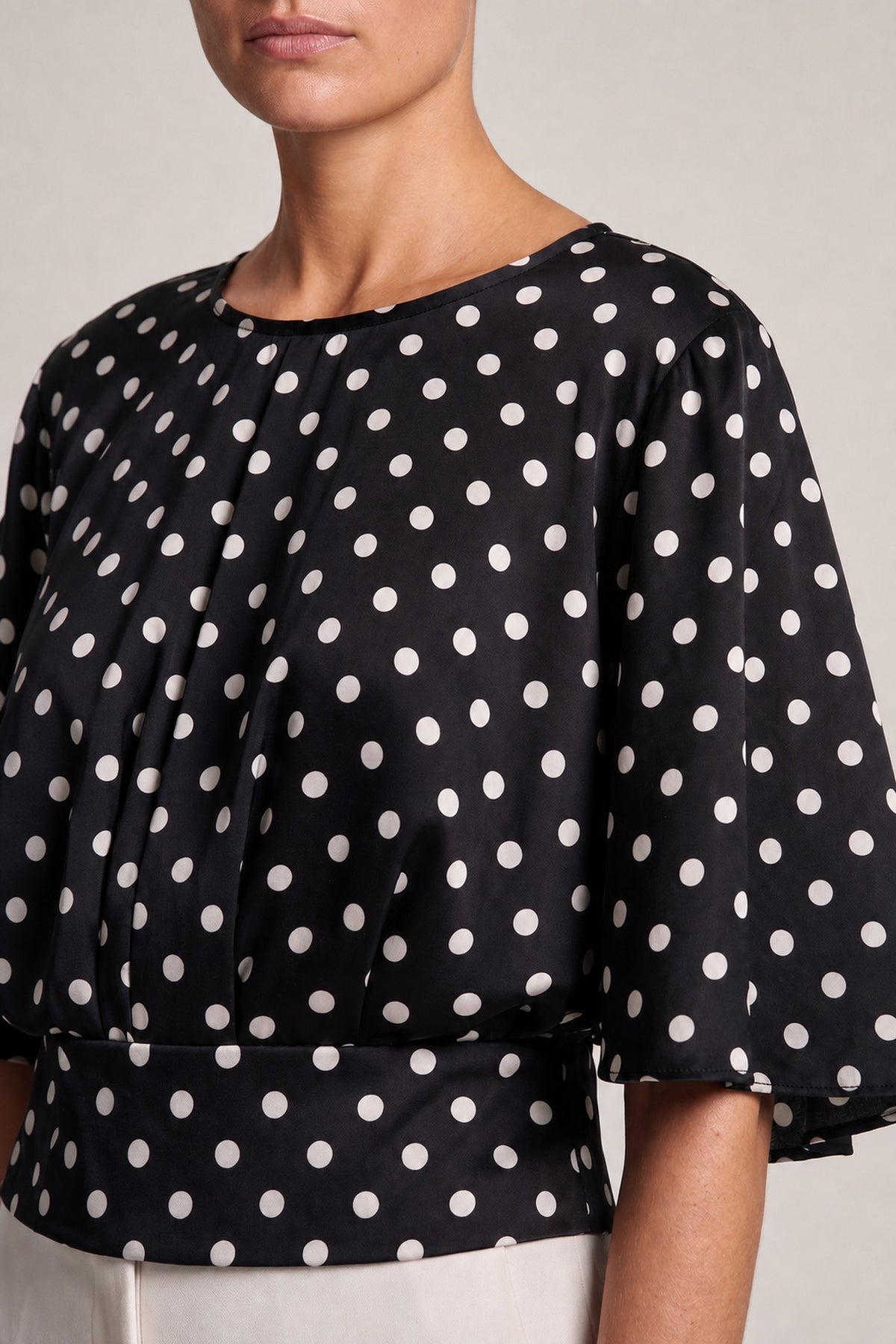 Dot Print Flared Sleeve Top In Black