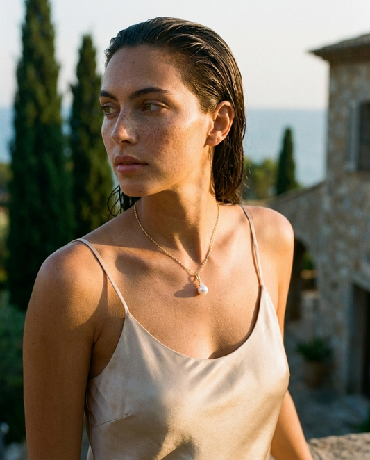 Aurore Pearl & Diamond Necklace 14K Gold worn at golden hour, terrace editorial