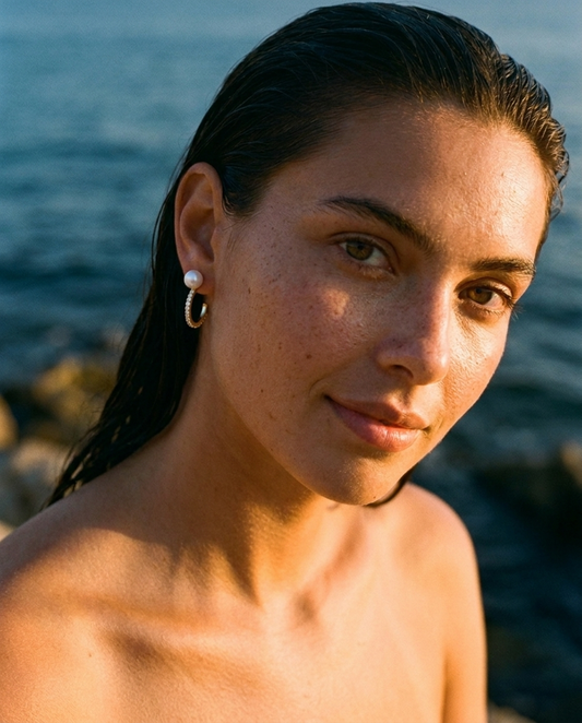 Aurore Pearl & Diamond Hoops 14K Gold worn at sunset, radiant editorial