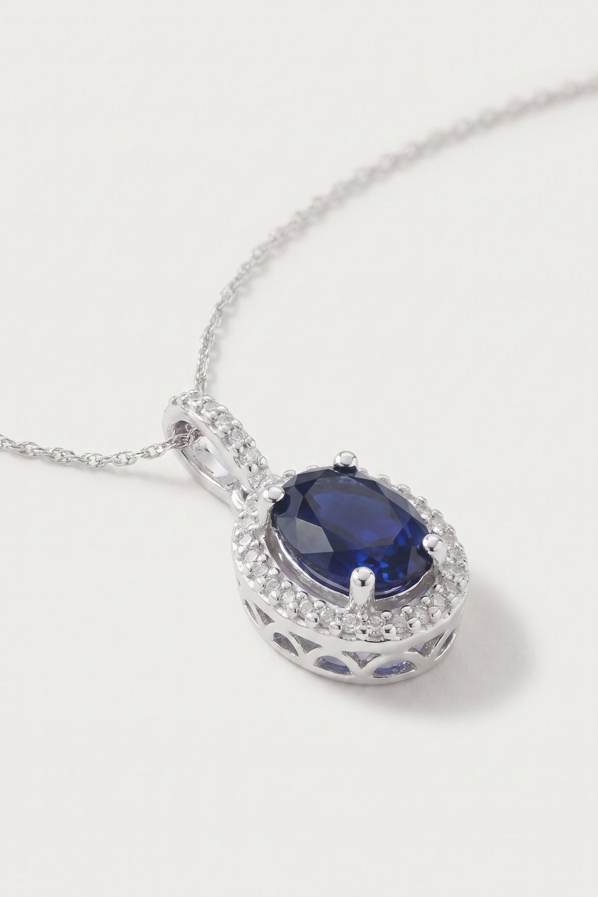Oval Sapphire and Diamond Halo Pendant Necklace detail