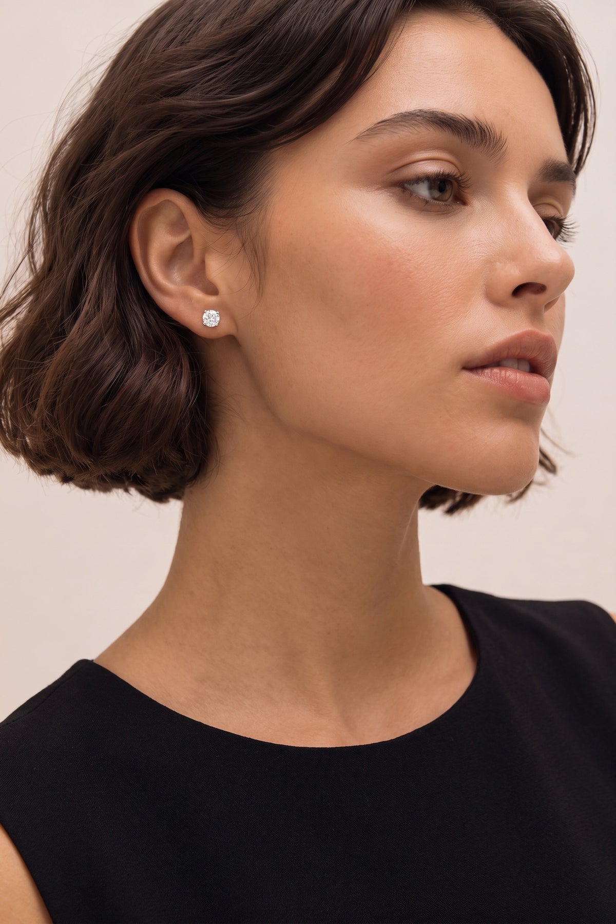 Round Brilliant Solitaire Stud Earrings on model